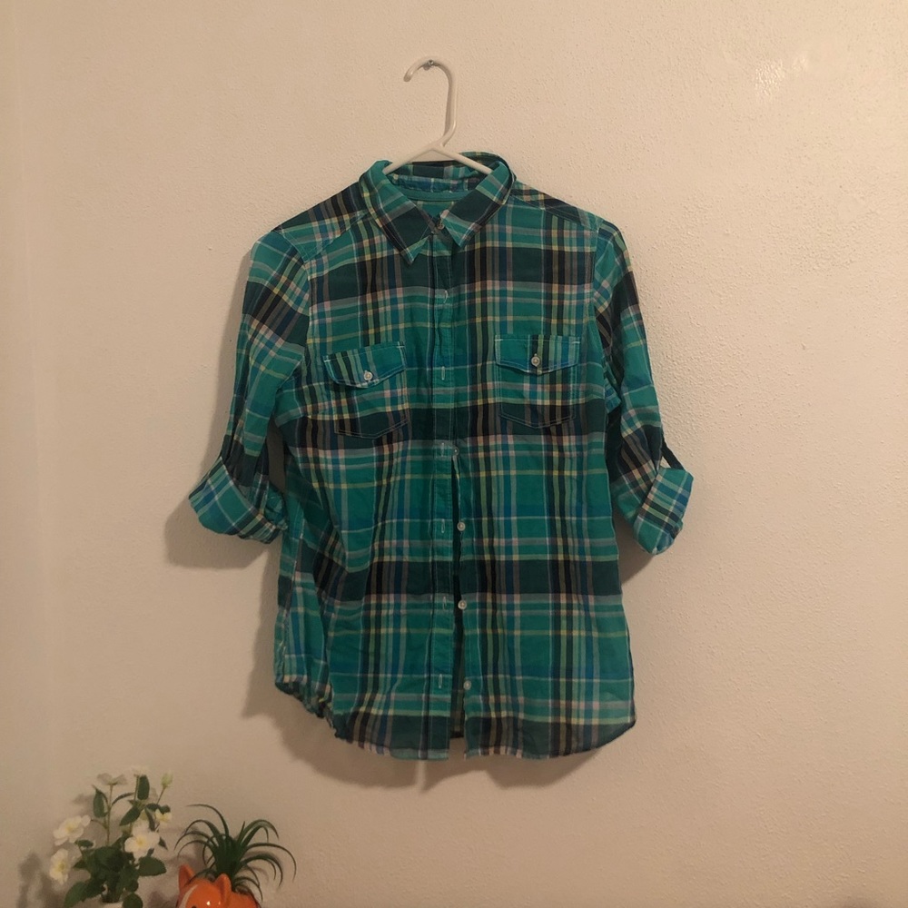 A nice/great quality green plaid shirt for girls.